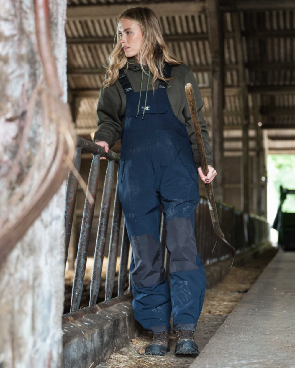 Navy Coloured Hoggs of Fife Green King II Waterproof Bib & Brace on farm background #colour_navy