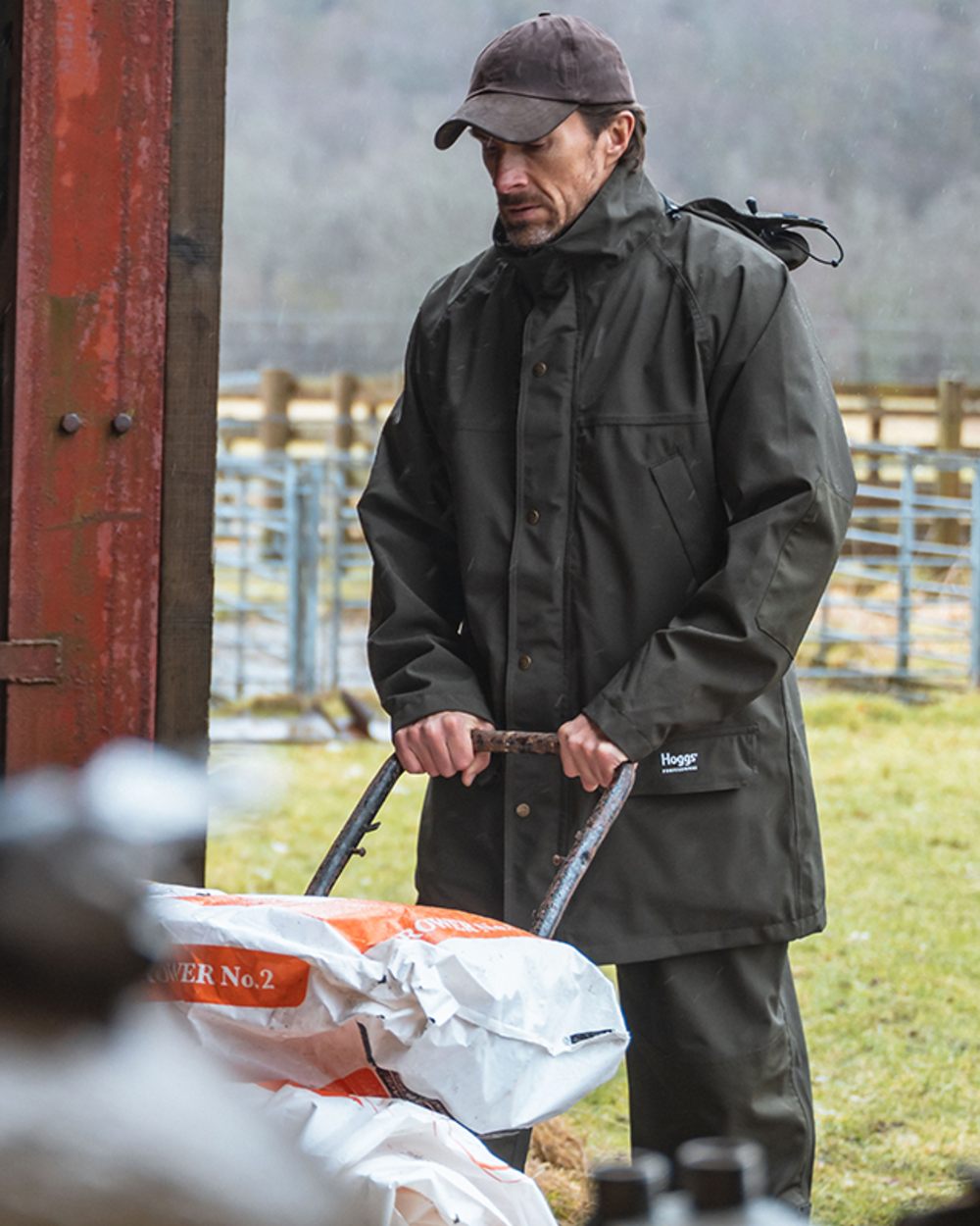 Green Coloured Hoggs of Fife Green King II Waterproof Jacket on outdoor background #colour_green
