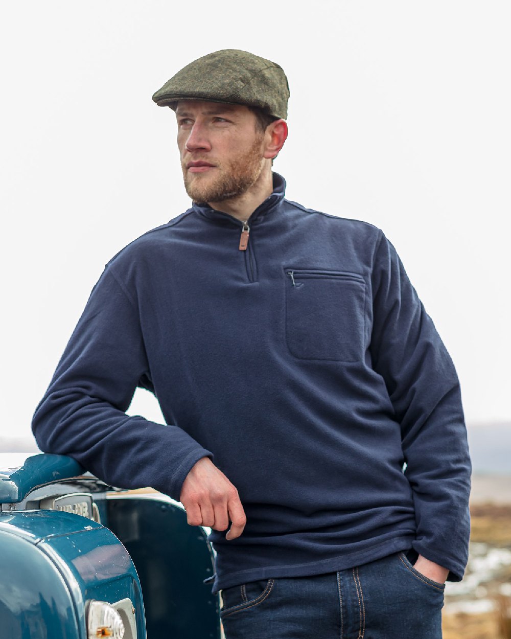 Navy coloured Hoggs of Fife Islander 1/4 Zip Micro Fleece Shirt on sky background #colour_navy
