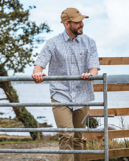 Green Red Coloured Hoggs of Fife Kessock Tattersall Short Sleeved Shirt on coastal background #colour_green-red