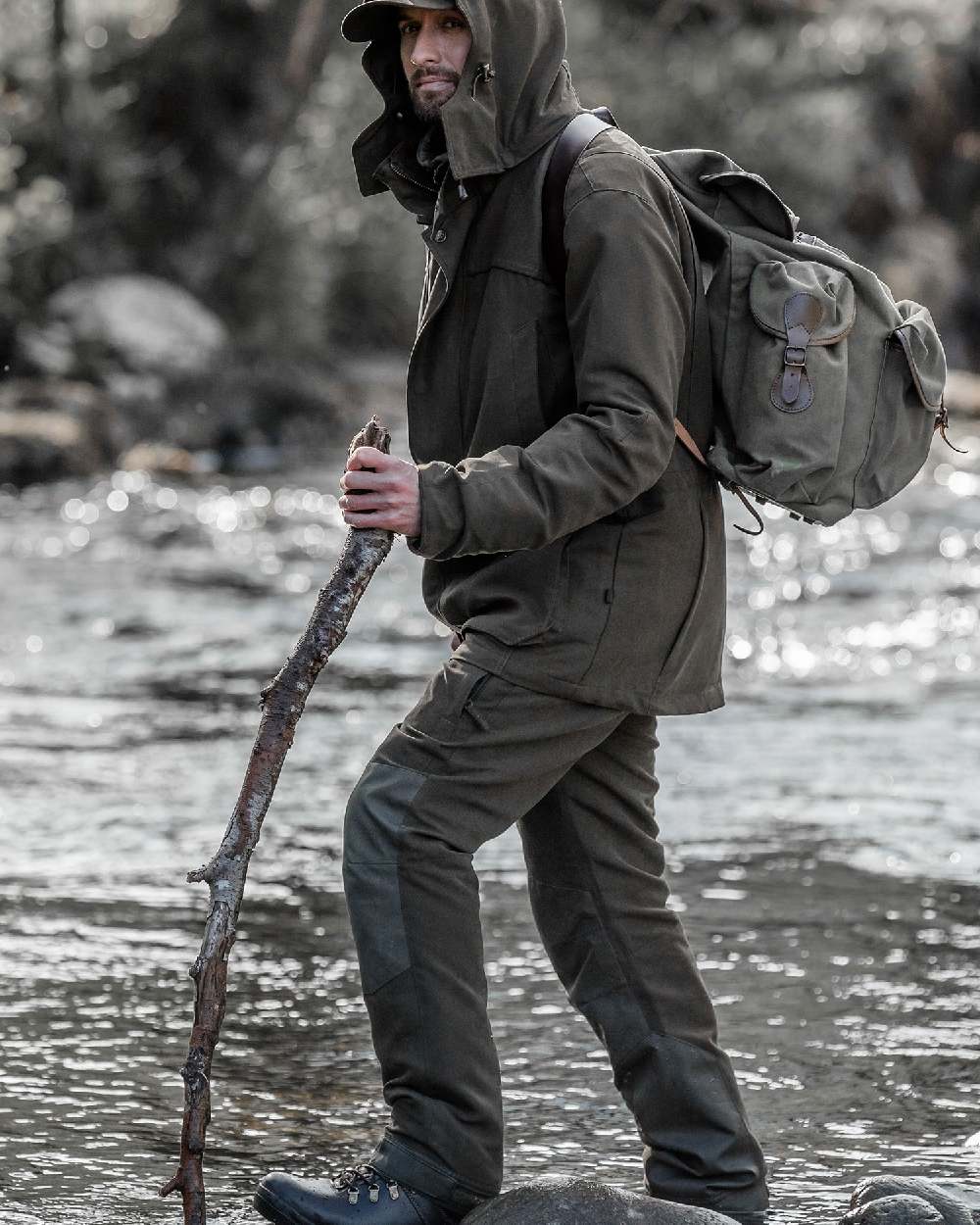 Olive Green Coloured Hoggs of Fife Kincraig Waterproof Field Trousers on river background #colour_olive-green