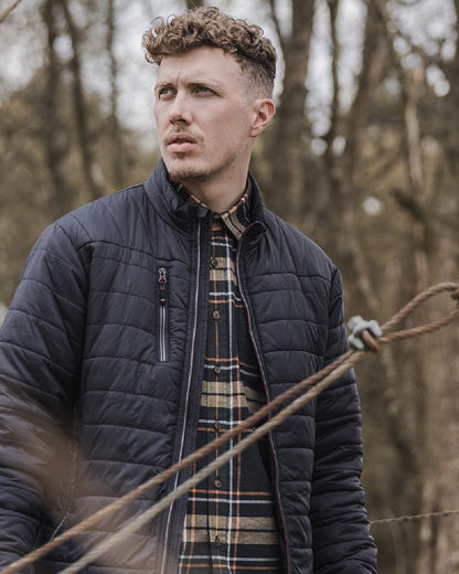 Navy Merlot Coloured Hoggs of Fife Kingston Lightweight Quilted Jacket on blurry background #colour_navy-merlot