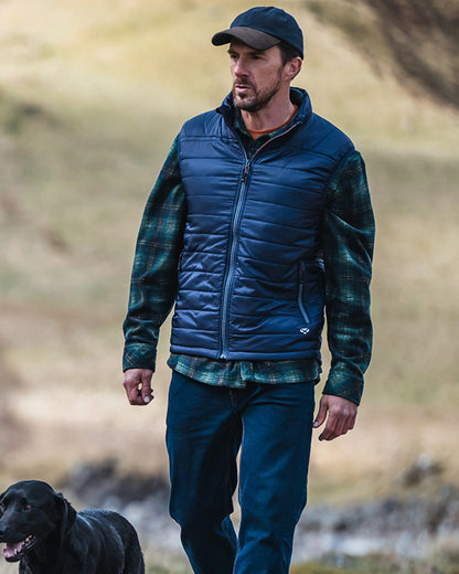 Navy Merlot coloured Hoggs of Fife Kingston Rip-Stop Gilet on mountain background #colour_navy-merlot