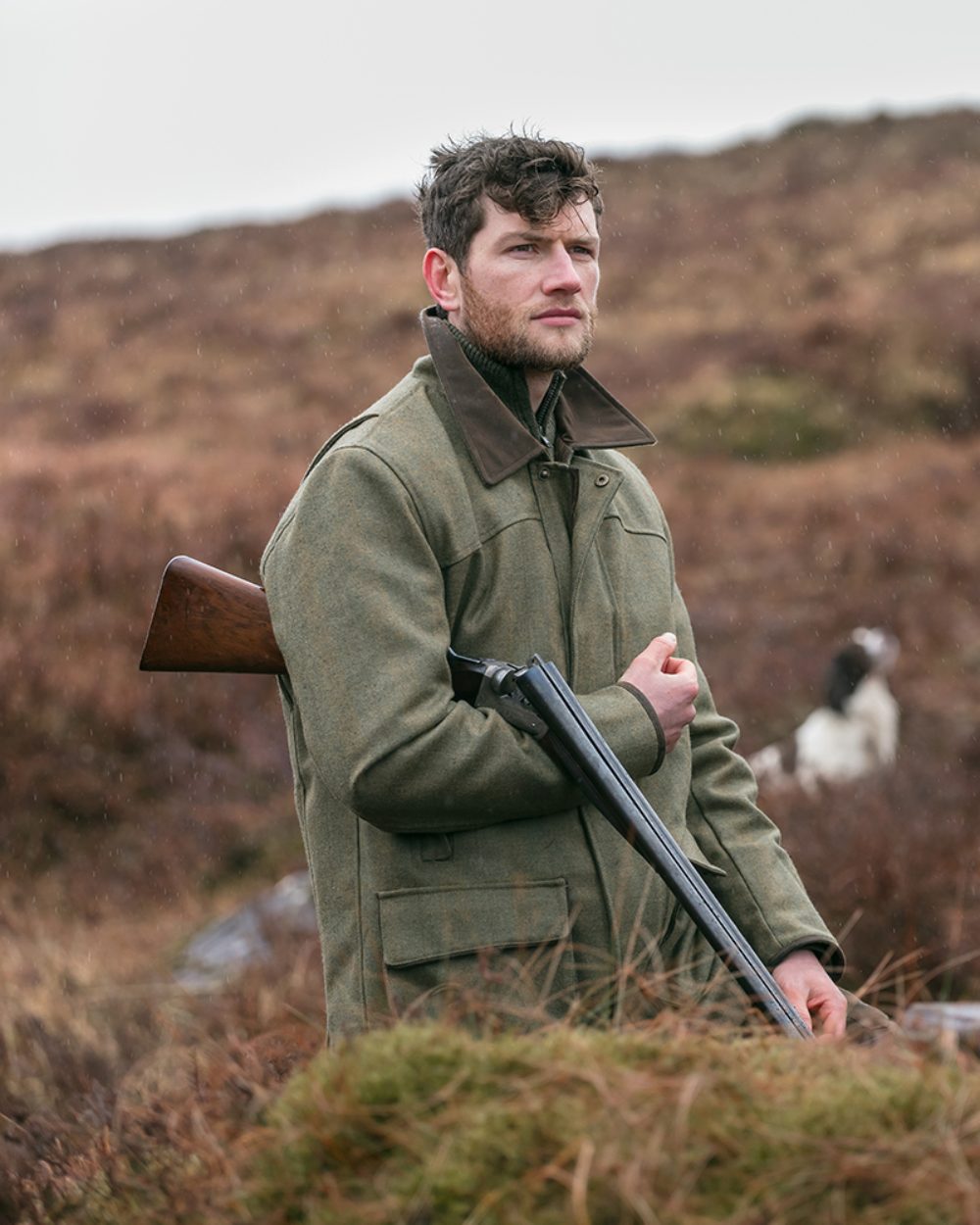 Autumn Bracken Coloured Hoggs of Fife Kinloch Technical Tweed Field Coat on mountain background #colour_autumn-bracken