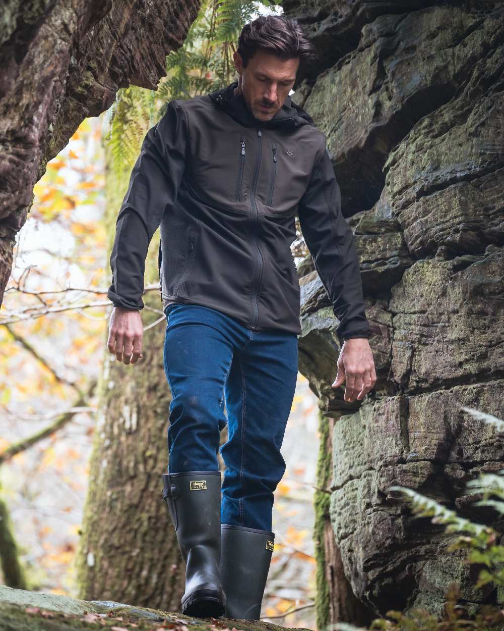 Green Coloured Hoggs of Fife Mens Ardross 4 Way Active Jacket on forest background #colour_green