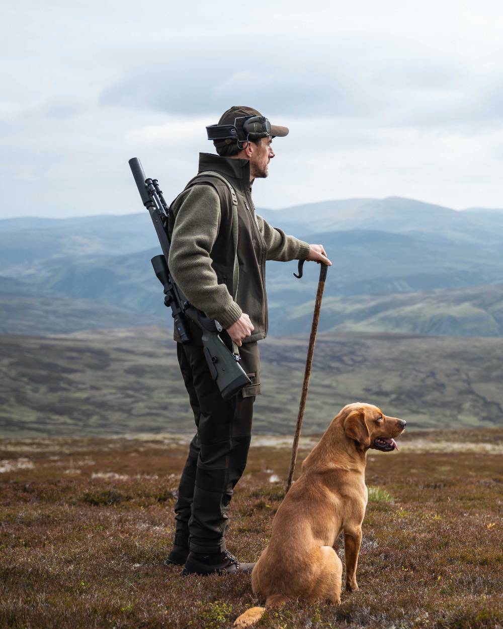 Green Coloured Hoggs of Fife Mens Ardross 4 Way Active Trousers on mountain background #colour_green