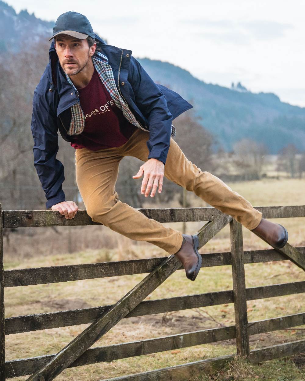Burgundy Coloured Hoggs of Fife Mens Canonbie Printed T-Shirt on mountain background #colour_burgundy