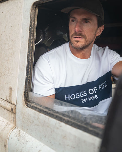 White Navy White Coloured Hoggs of Fife Mens Dalbeattie Colour Block T-Shirt on car background #colour_white-navy-white