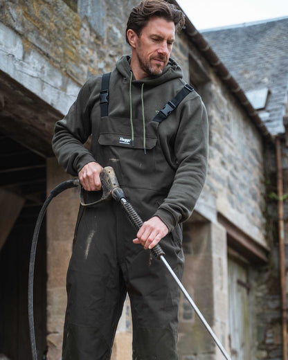 Forest Lovat coloured Hoggs of Fife Mens Hoodie on outdoor background #colour_forest-lovat