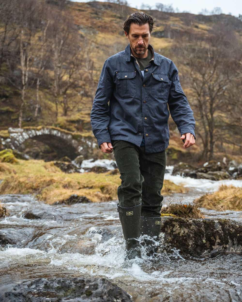 Midnight Navy Coloured Hoggs of Fife Mens Huntly Waxed Canvas Utility Overshirt on mountain background #colour_midnight-navy