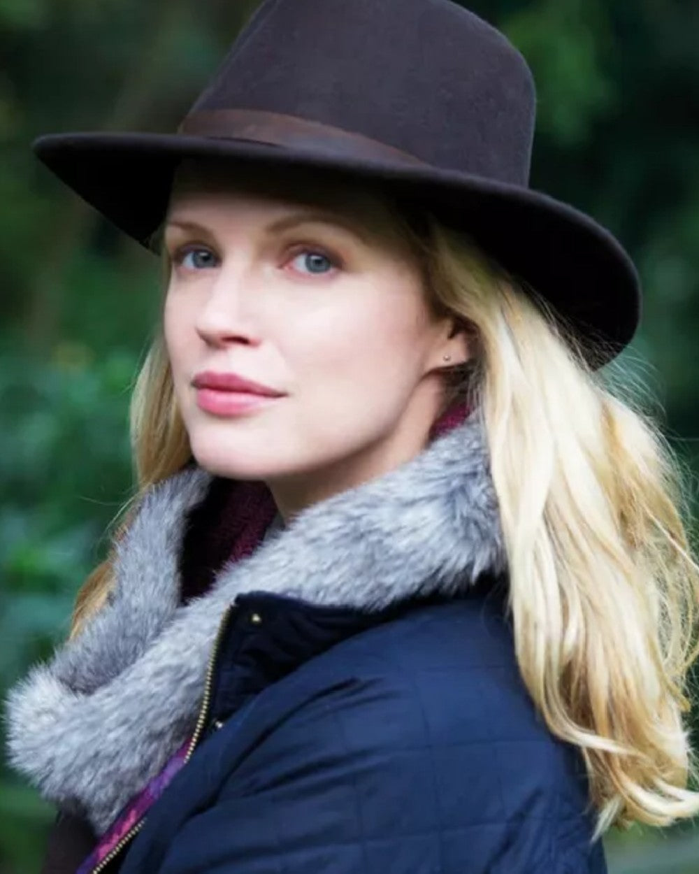 Navy Coloured Hoggs of Fife Perth Crushable Felt Hat on blurry background #colour_navy