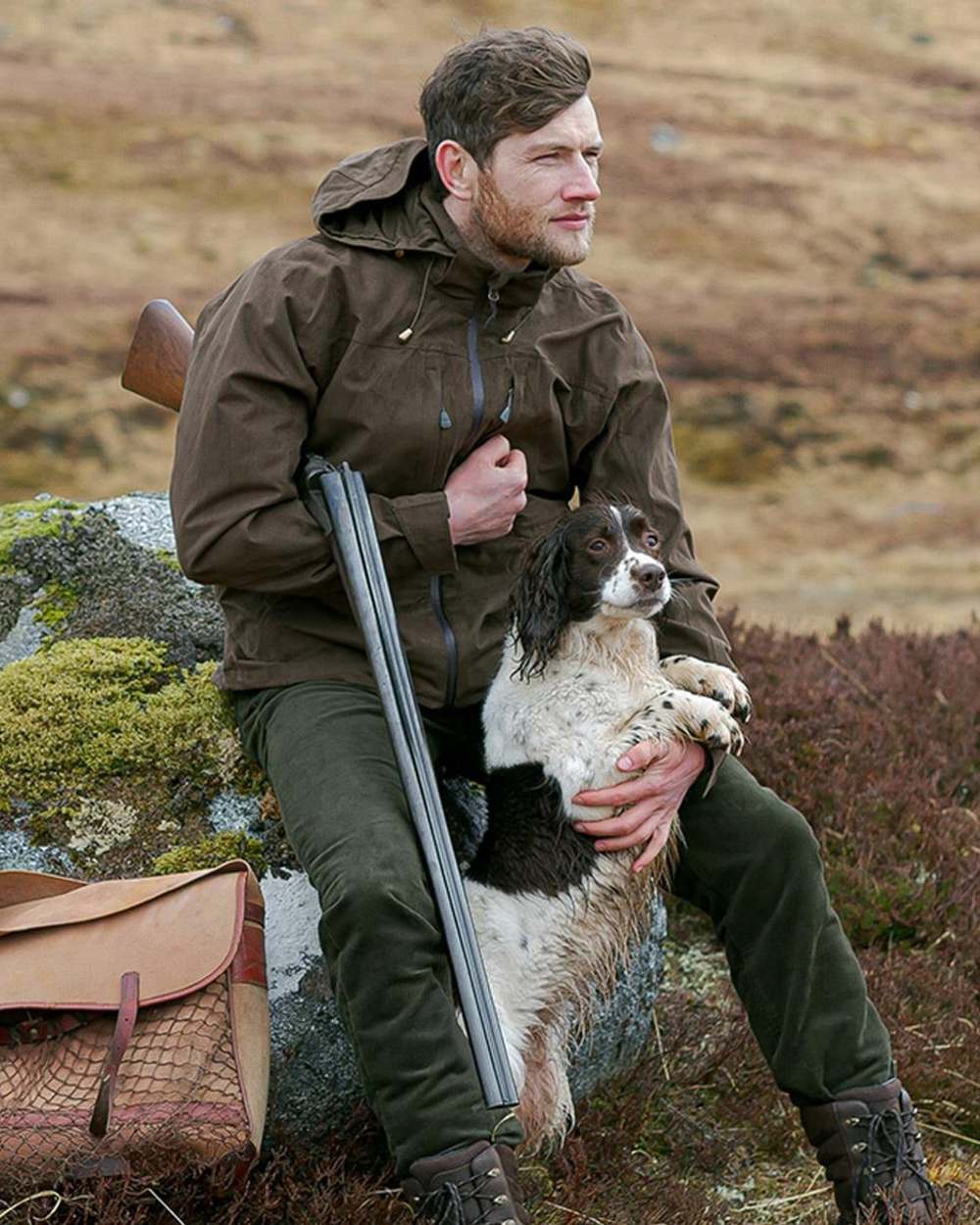Brown Coloured Hoggs of Fife Rannoch Waterproof Shooting Jacket on countryside background #colour_brown
