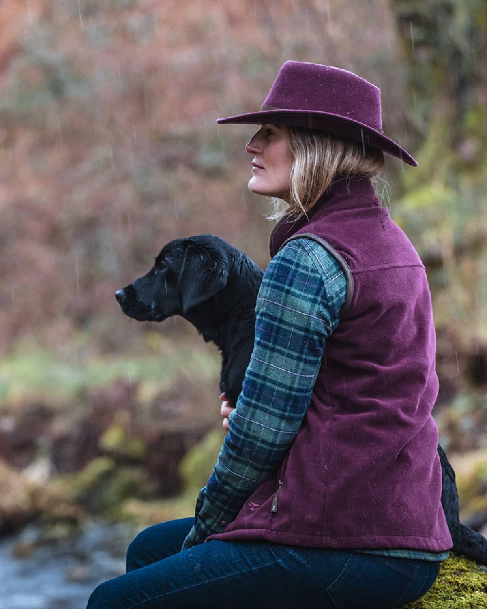 Merlot Coloured Hoggs of Fife Stenton Ladies Fleece Gilet on forest background #colour_merlot