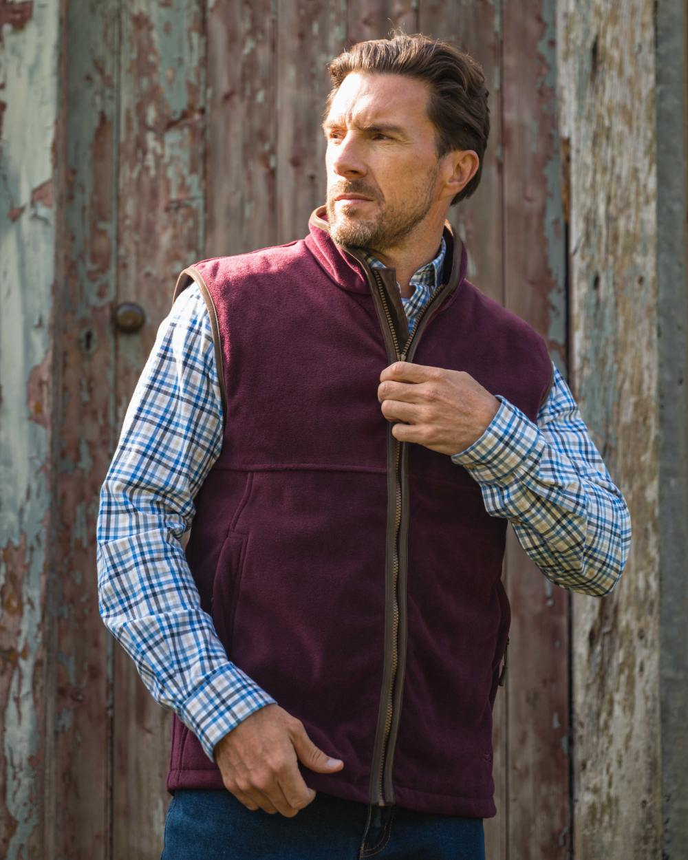 Merlot coloured Hoggs of Fife Stenton Technical Fleece Gilet on outdoor background #colour_merlot
