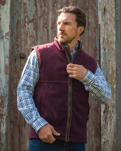 Merlot coloured Hoggs of Fife Stenton Technical Fleece Gilet on outdoor background #colour_merlot