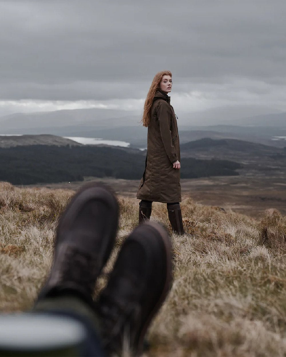 Sage Coloured Hoggs of Fife Struther Ladies Long Riding Coat on mountain background #colour_sage