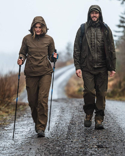 Sage Coloured Hoggs of Fife Struther Ladies Waterproof Trousers on road background #colour_sage