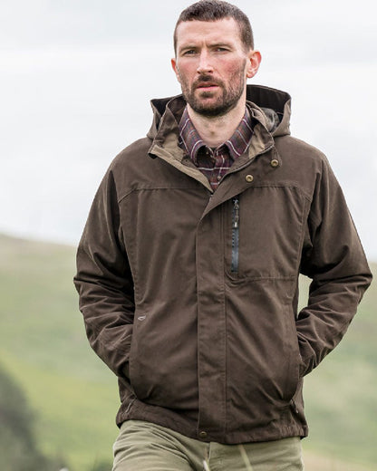 Dark Green coloured Hoggs of Fife Struther Waterproof Lightweight Jacket on sky background #colour_dark-green