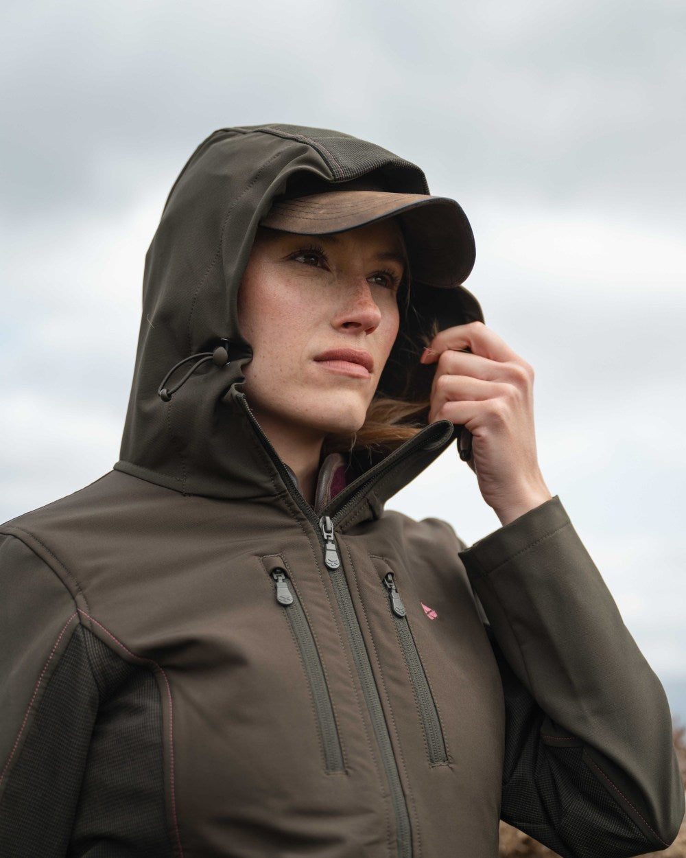 Green Coloured Hoggs of Fife Womens Ardross 4-Way Active Jacket on mountain background #colour_green