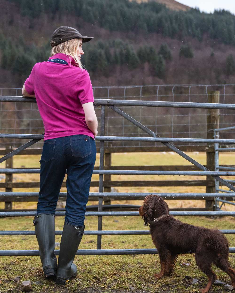 Berry Coloured Hoggs of Fife Womens Cora Pique Polo Shirt on countryside background #colour_berry