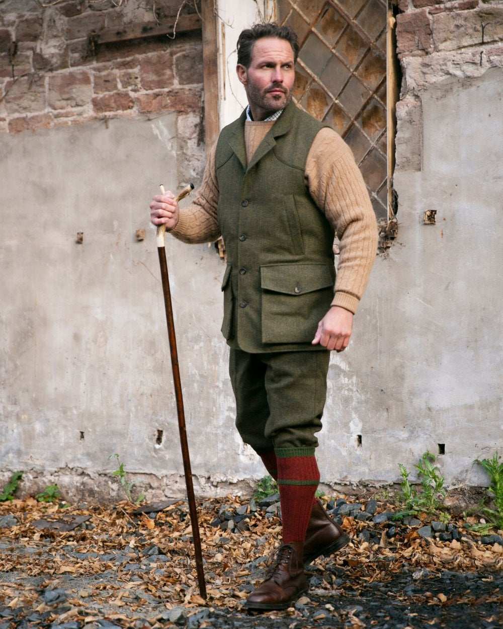 Rosehip coloured House of Cheviot Kyle Socks on wall background #colour_rosehip