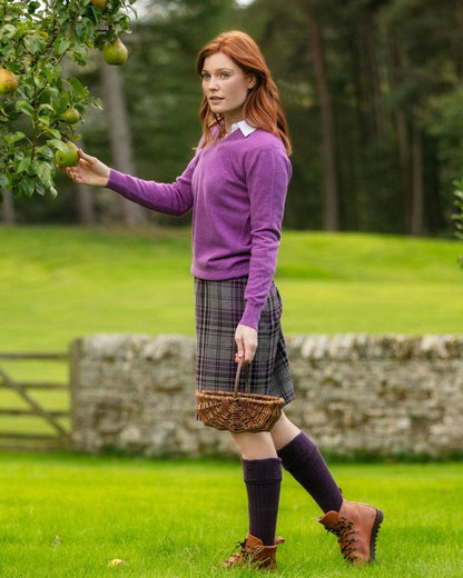 Thistle coloured House of Cheviot Lady Glenmore Socks on field background #colour_thistle