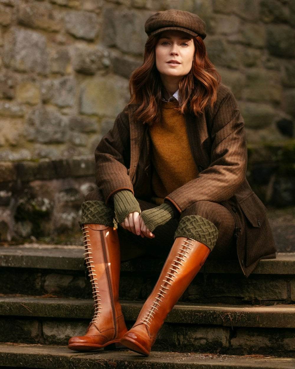 Dark Olive coloured House of Cheviot Lady Rannoch Socks on stairs background #colour_dark-olive