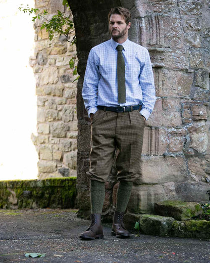 Bracken coloured House of Cheviot Scarba Socks on wall background #colour_bracken