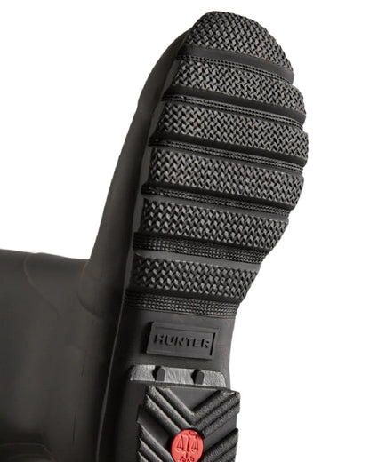 Black coloured Hunter Womens Original Tall Back Adjustable Wellington Boots on white background #colour_black