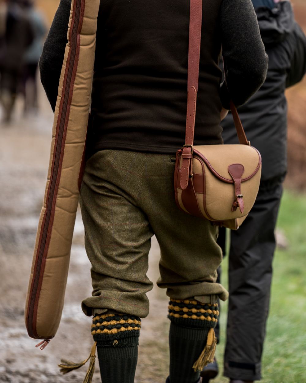 Fawn coloured Jack Pyke Canvas Cartridge Bag on blurry background #colour_fawn