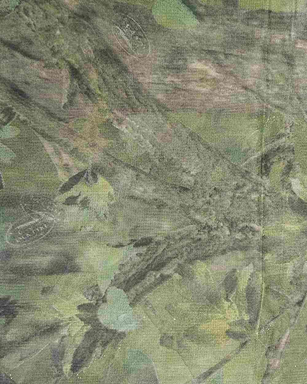 Woodland coloured Jack Pyke Clearview Hide Net on forest background #colour_woodland