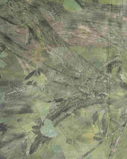 Woodland coloured Jack Pyke Clearview Hide Net on forest background #colour_woodland