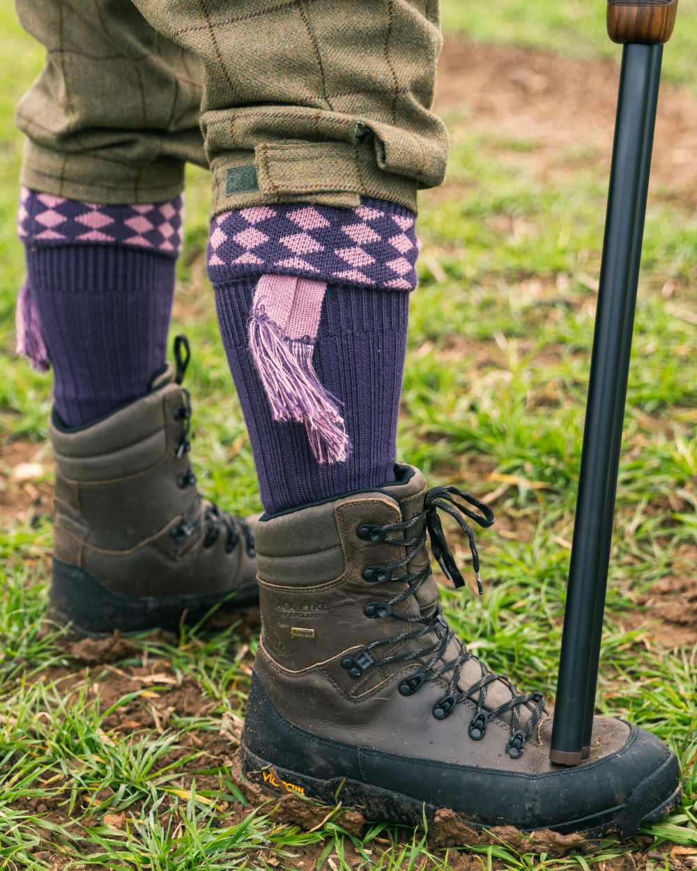 Purple Coloured Jack Pyke Harlequin Socks on outdoor background #colour_purple