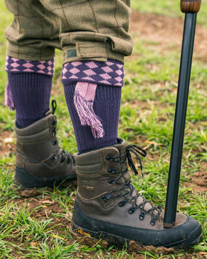 Purple Coloured Jack Pyke Harlequin Socks on outdoor background #colour_purple