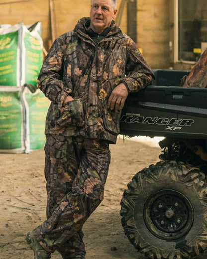 EVO coloured Jack Pyke Hunters Trousers on truck background #colour_evo