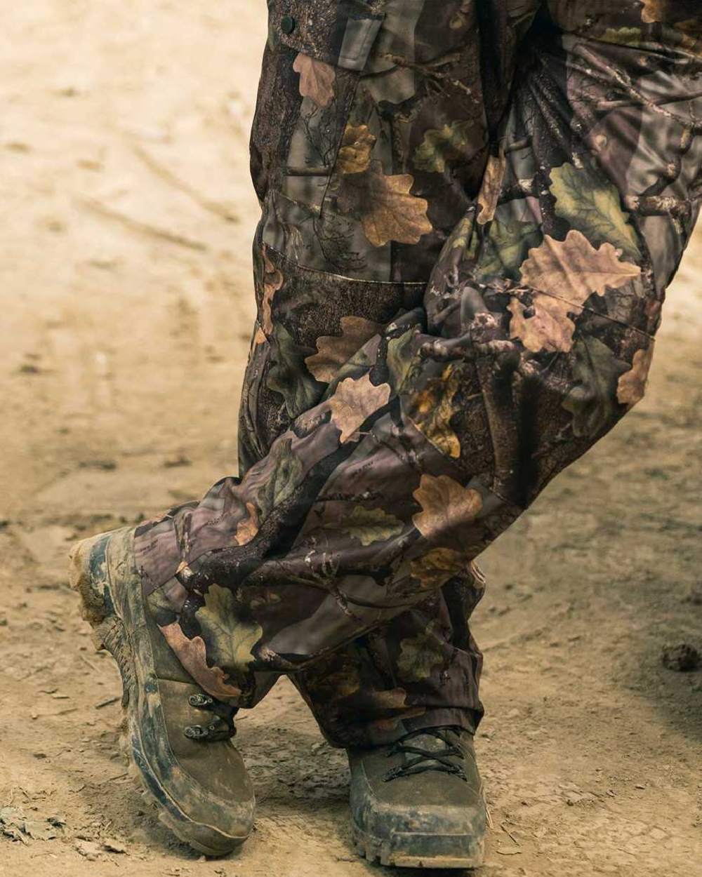 EVO coloured Jack Pyke Hunters Trousers on soil background #colour_evo