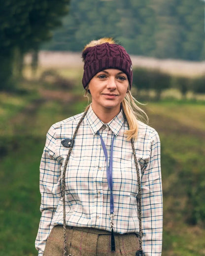 Navy coloured Jack Pyke Ladies Countryman Shirt on blurry background #colour_navy