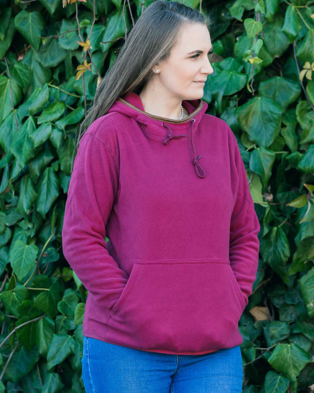 Roselle coloured Jack Pyke Ladies Fleece Hoodie on leafy background #colour_roselle