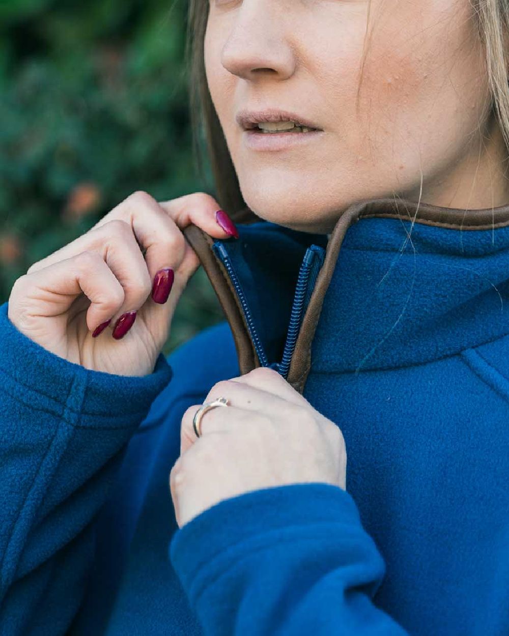Denim coloured Jack Pyke Ladies Fleece Jacket on blurry background #colour_denim