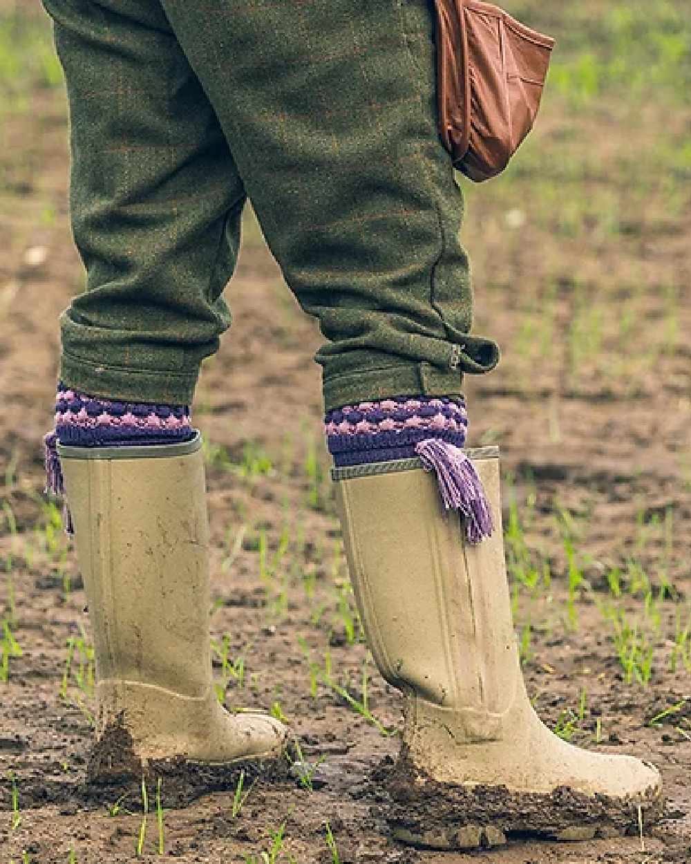 Purple coloured Jack Pyke Pebble Socks on mud background #colour_purple