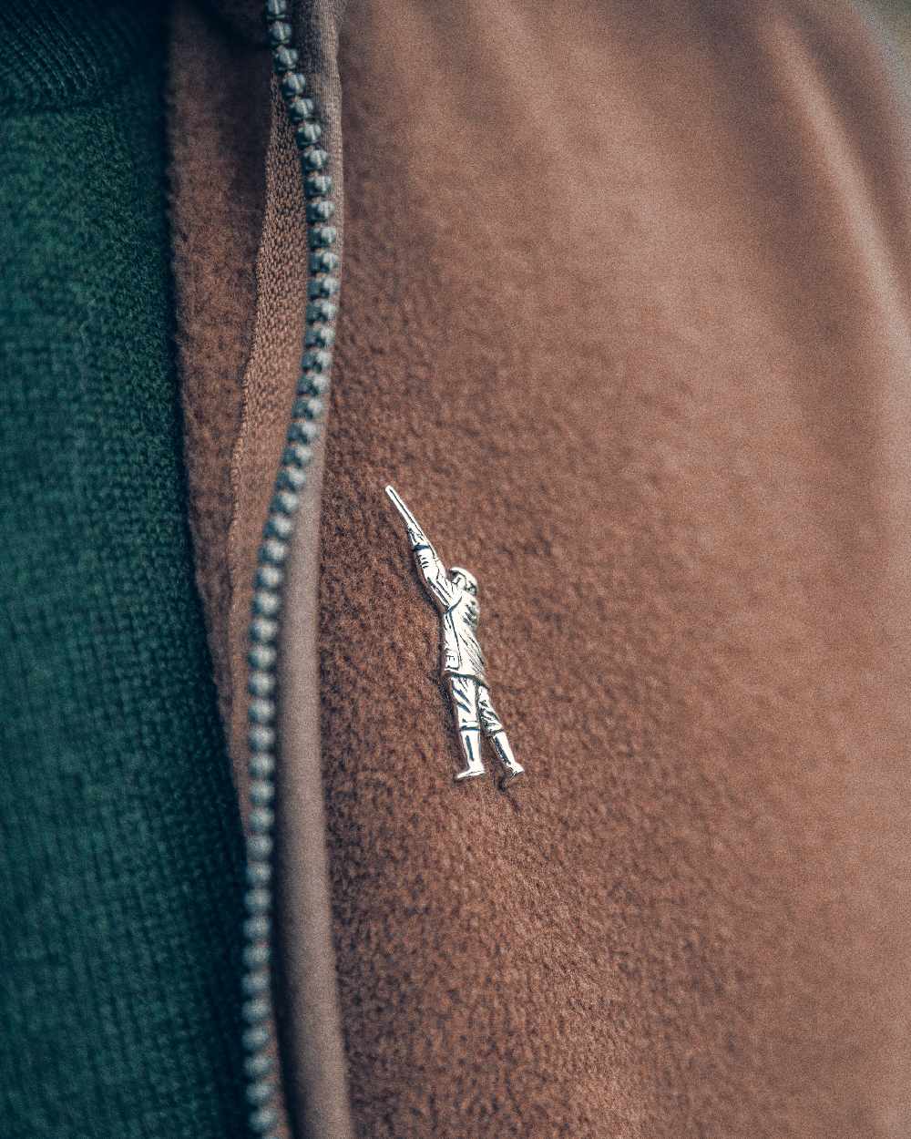 Countryman styled Jack Pyke Pin Badge on blurry background #style_countryman
