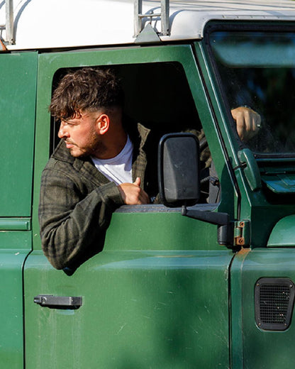 Green Check coloured Jack Pyke Polar Fleece Shirt on truck background #colour_green-check