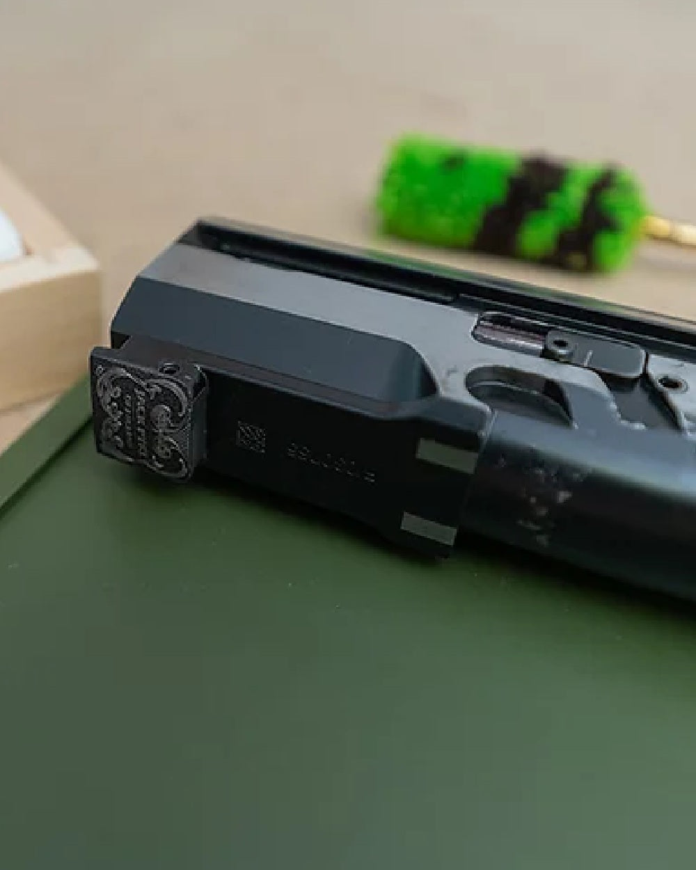 Green coloured Jack Pyke Silicone Gun Maintenance Mat on table background #colour_green