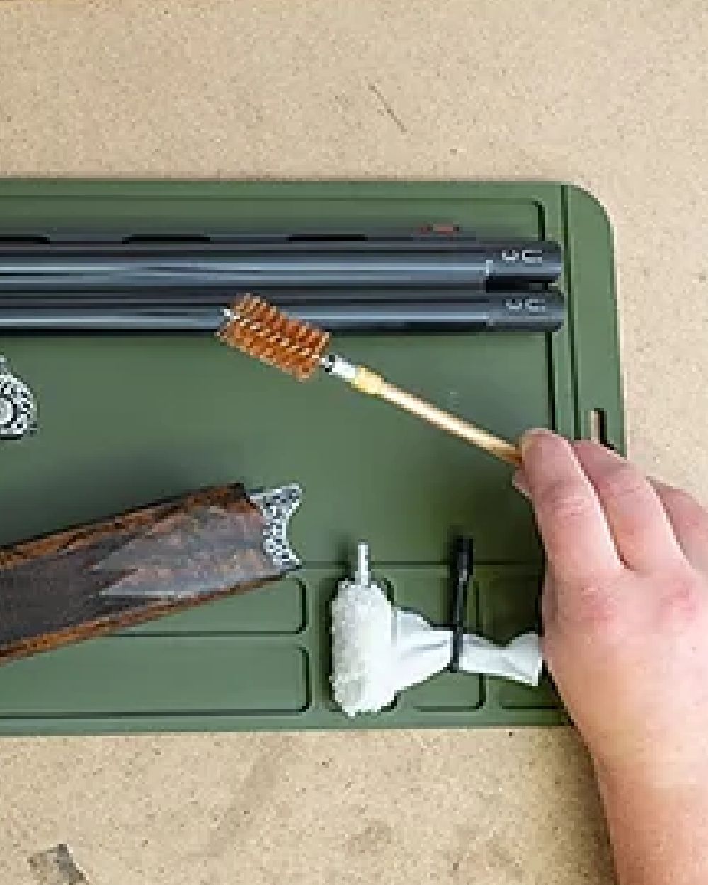 Green coloured Jack Pyke Silicone Gun Maintenance Mat on table background #colour_green