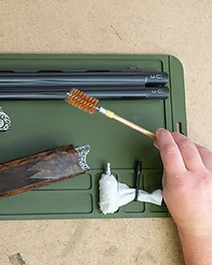 Green coloured Jack Pyke Silicone Gun Maintenance Mat on table background #colour_green