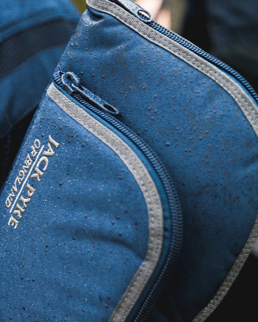Blue coloured Jack Pyke Sporting Gun Slip on outdoor background #colour_blue