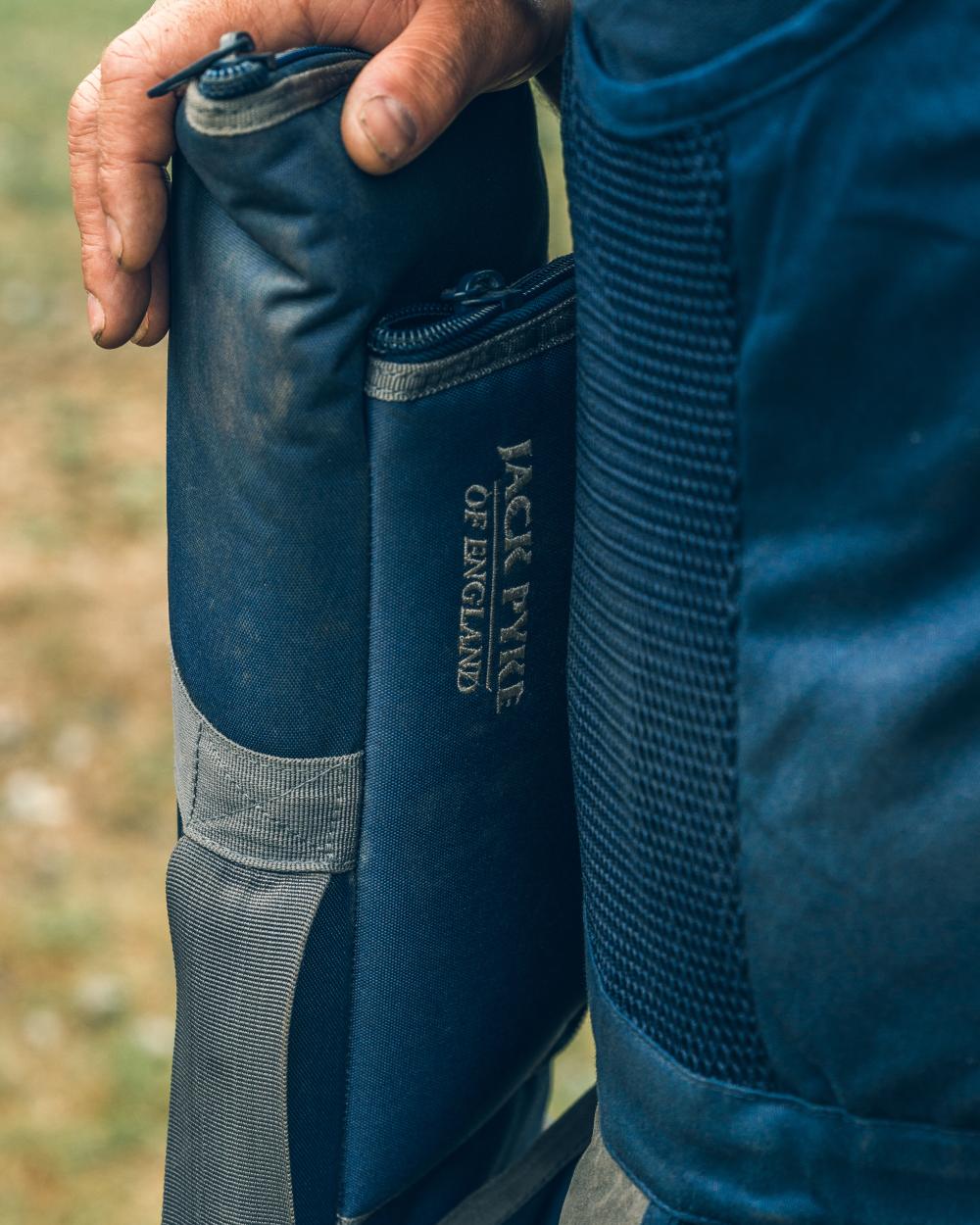 Blue coloured Jack Pyke Sporting Gun Slip on outdoor background #colour_blue