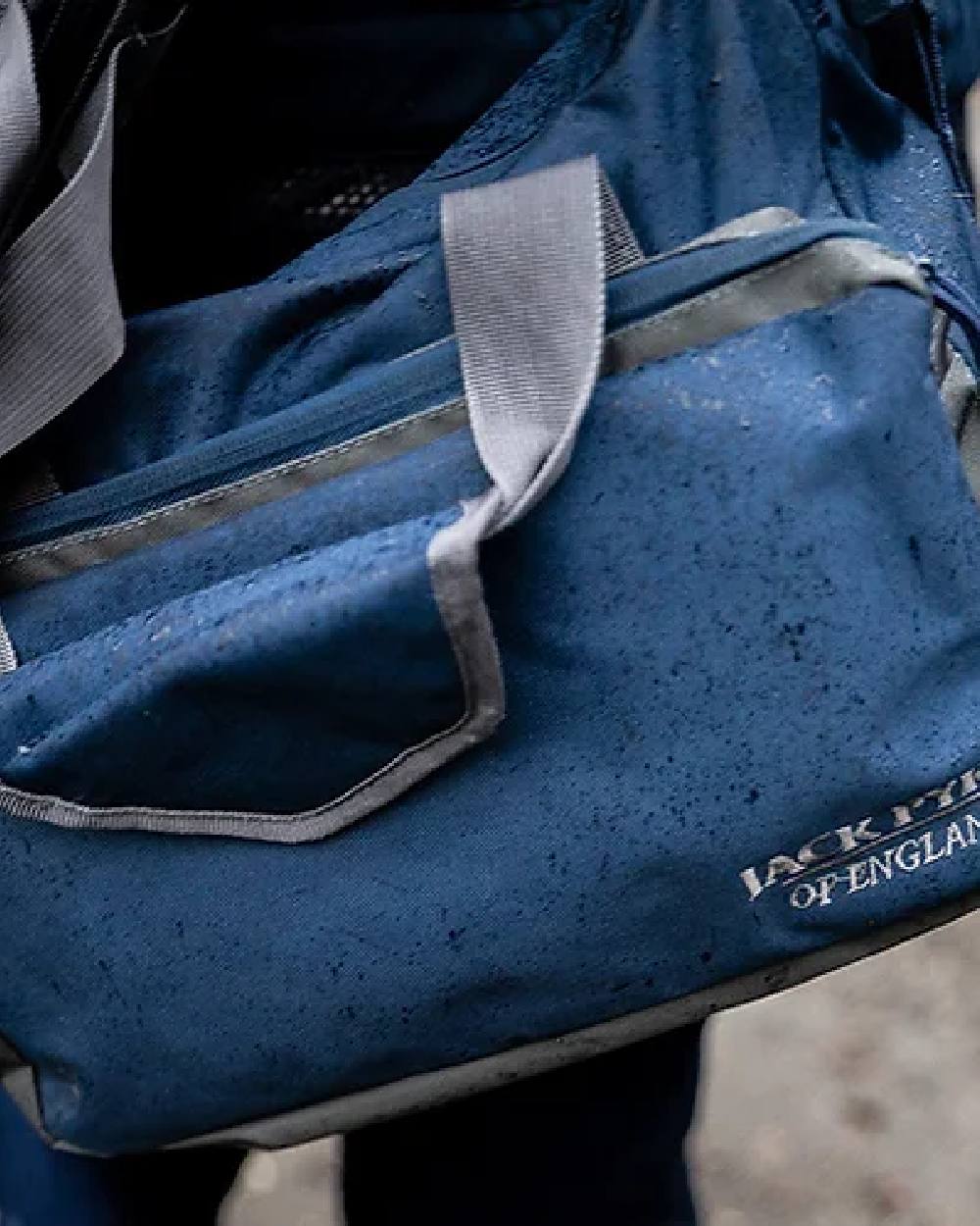 Blue coloured Jack Pyke Sporting Shoulder Bag on blurry background #colour_blue