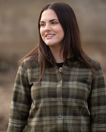 Green coloured Jack Pyke Womens Bleasdale Heavy Flannel Shirt on blurry background #colour_green