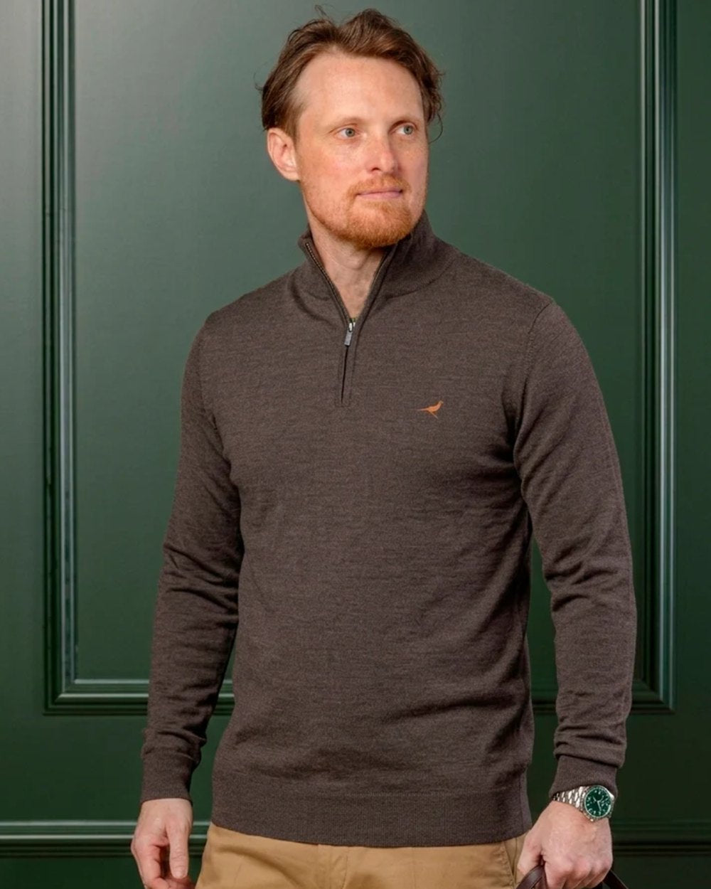 Chocolate Coloured Laksen Norfolk Zip Neck Merino Sweater on indoor background #colour_chocolate